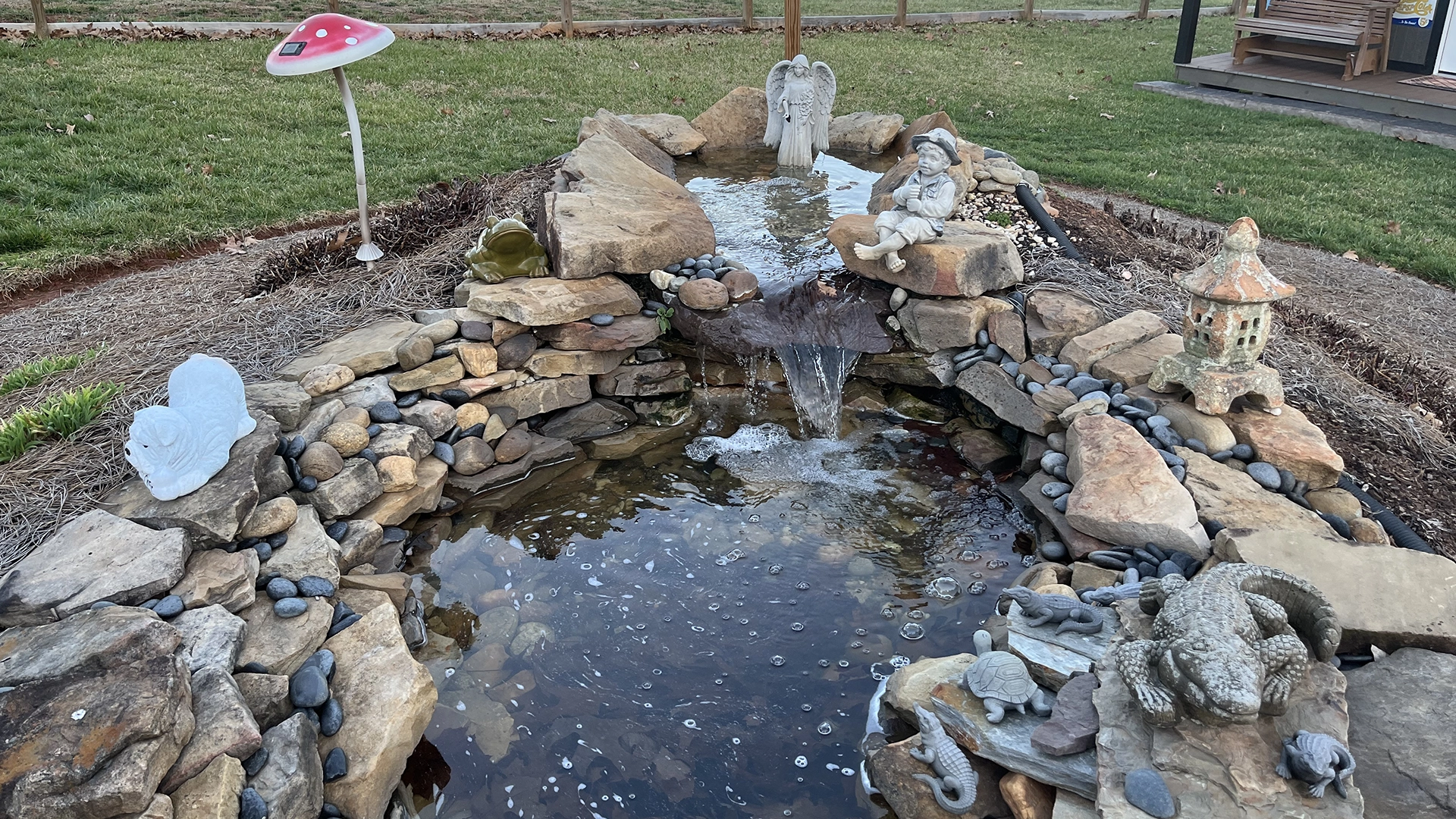 Rock pond with water feature